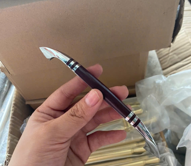 TAY NẮM ĐŨA NGŨ KIM PHÁT TRIỂN